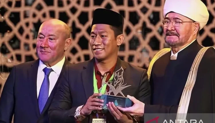 عمران الكريم الفائز الأول في مسابقة القرآن الكريم بروسيا ٢٠٢٦، merdeka.com